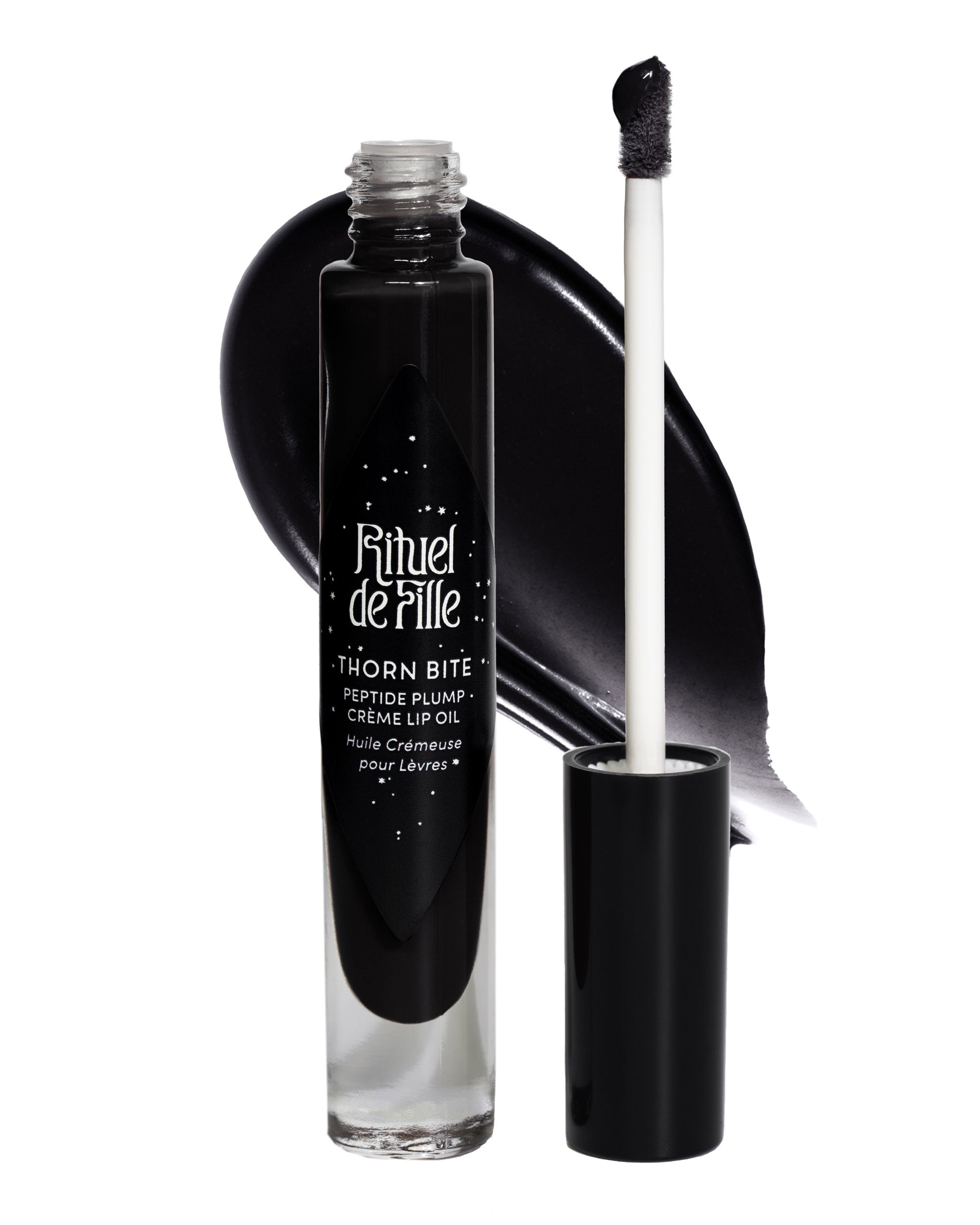 Lip gloss with applicator and black cap on a white background