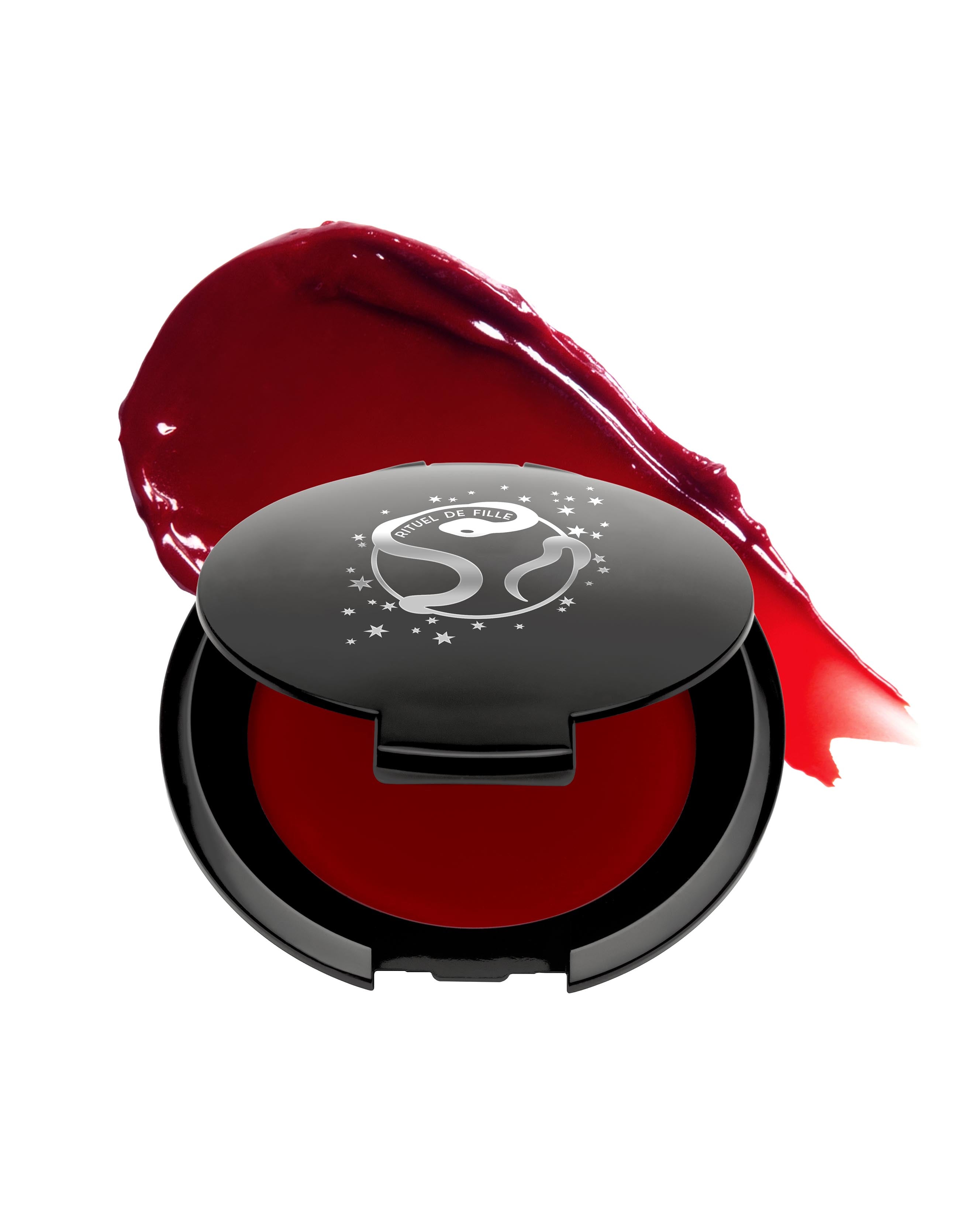 Red makeup in black compact with Rituel de Fille logo on a white background