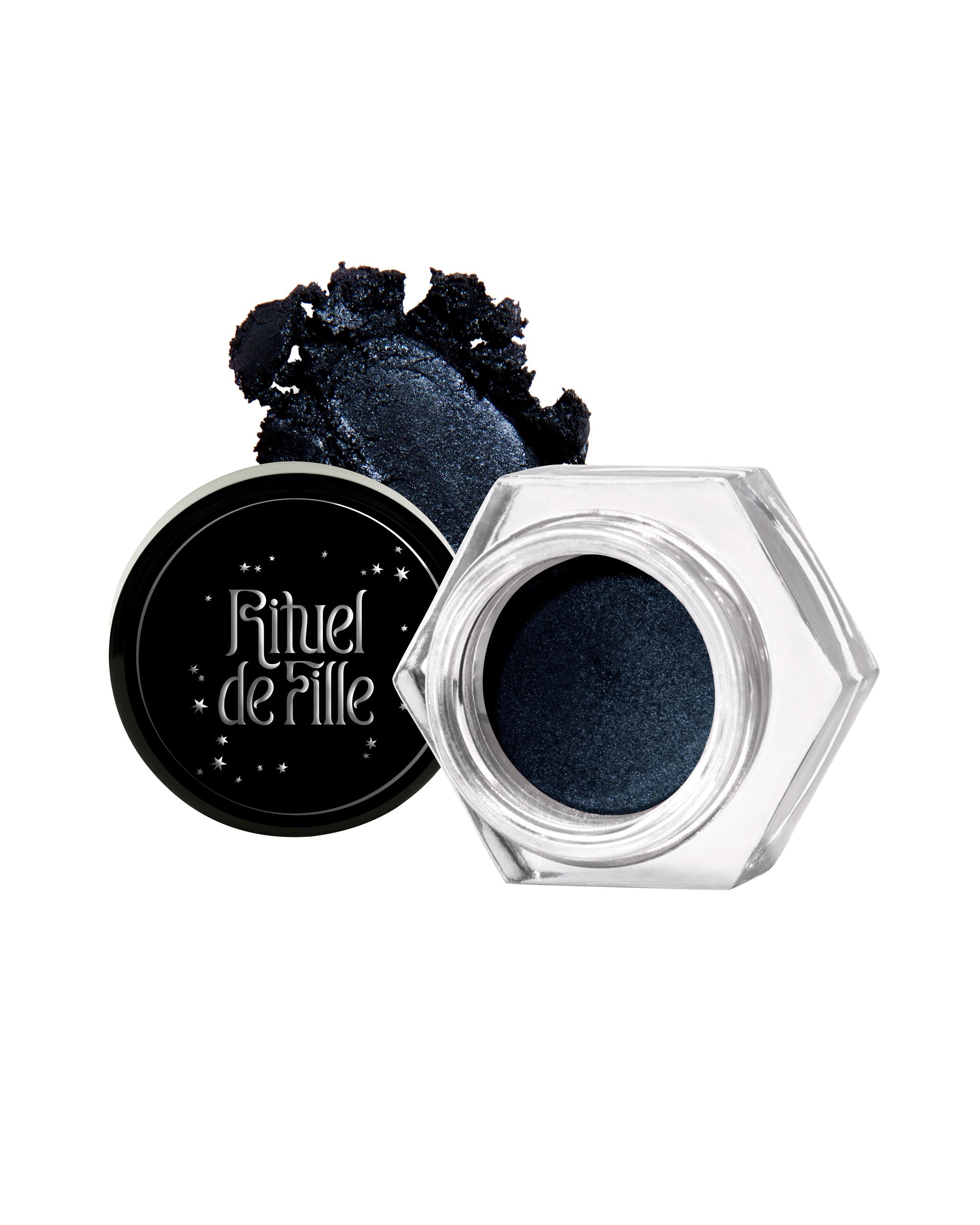 Hexagonal jar of black eyeshadow with 'Rituel de Peille' branding on a white background