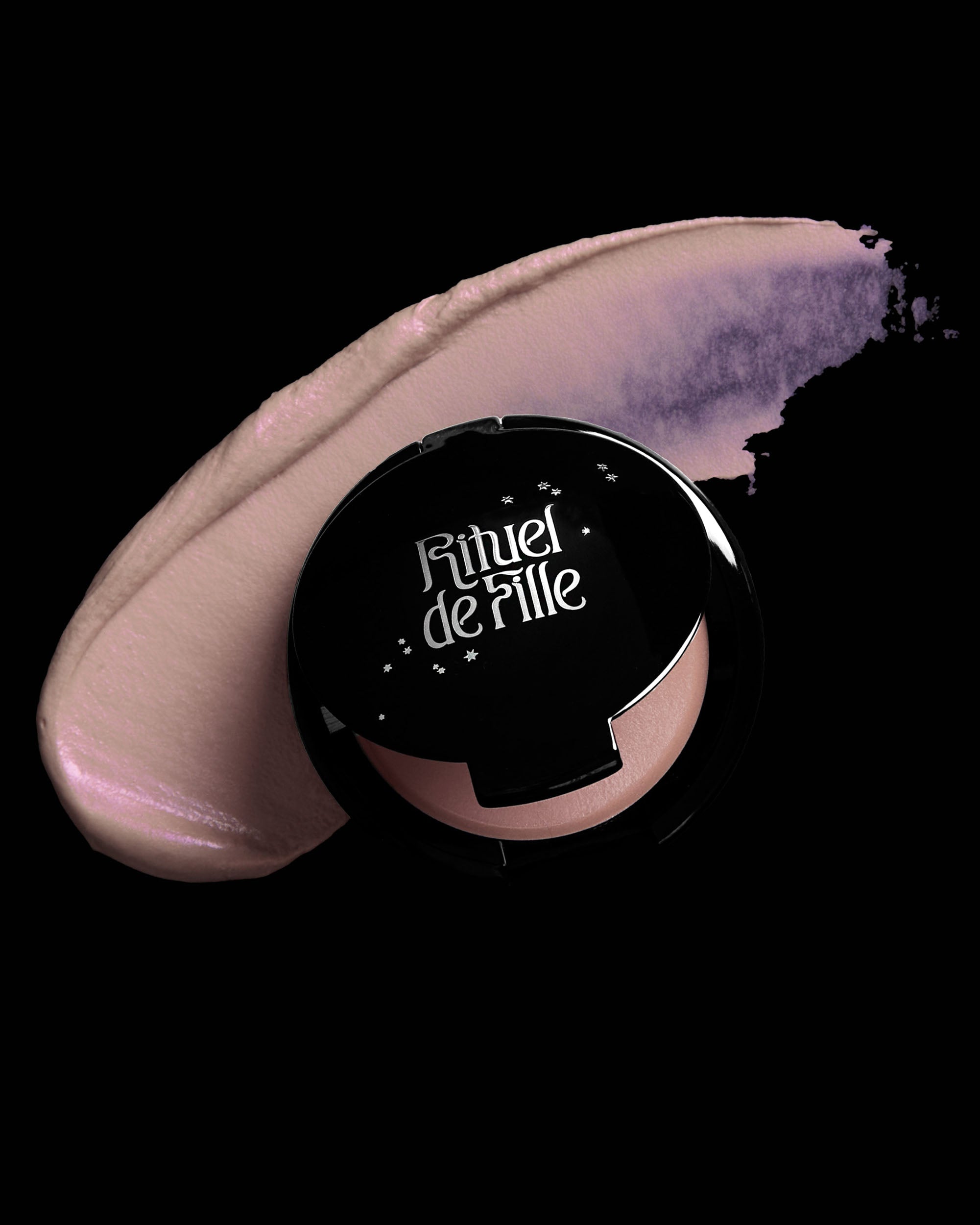 Highlighter with 'Rituel de Fille' branding on a dark background
