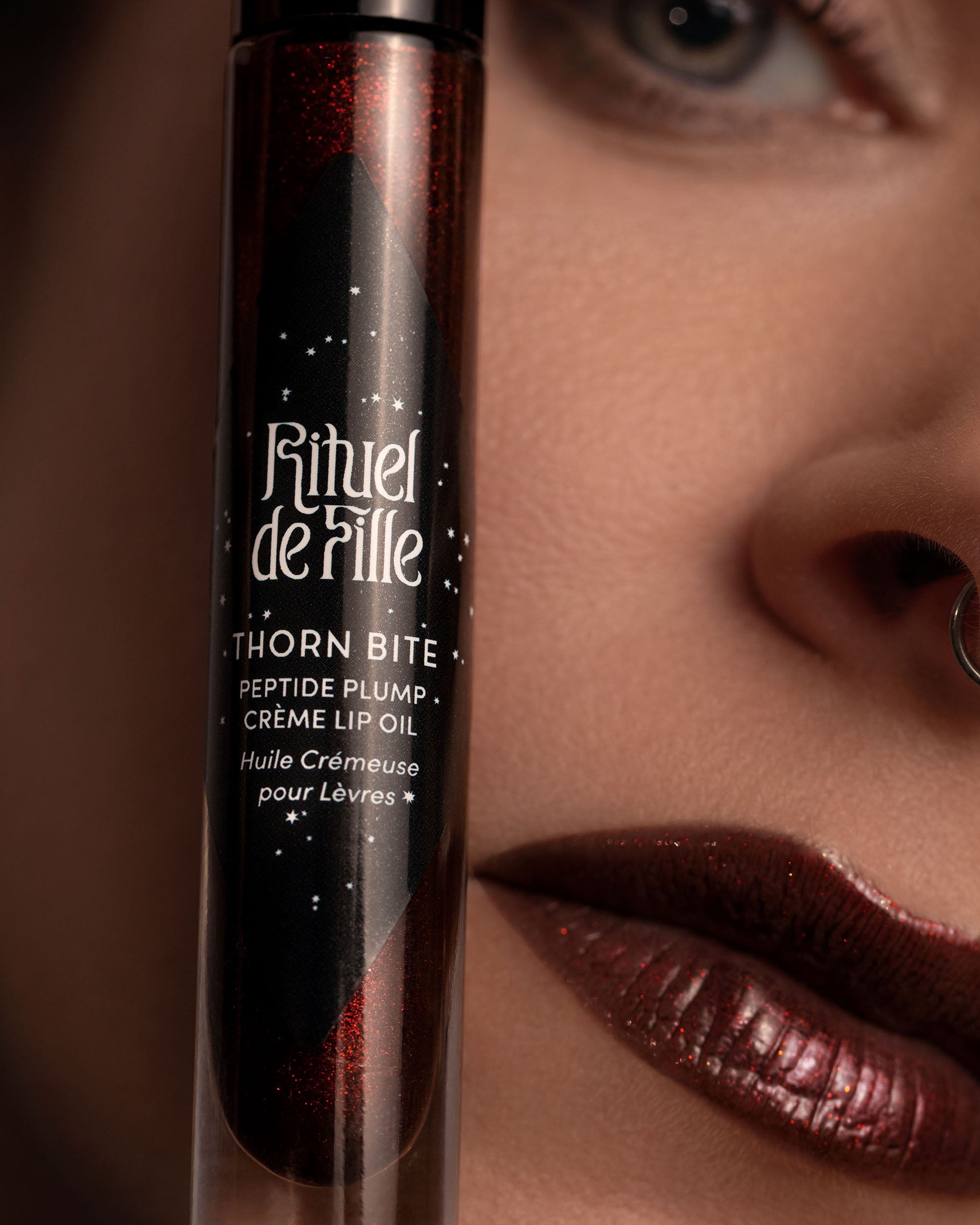 Close-up lip macro of Night Flower Thorn Bite lip oil