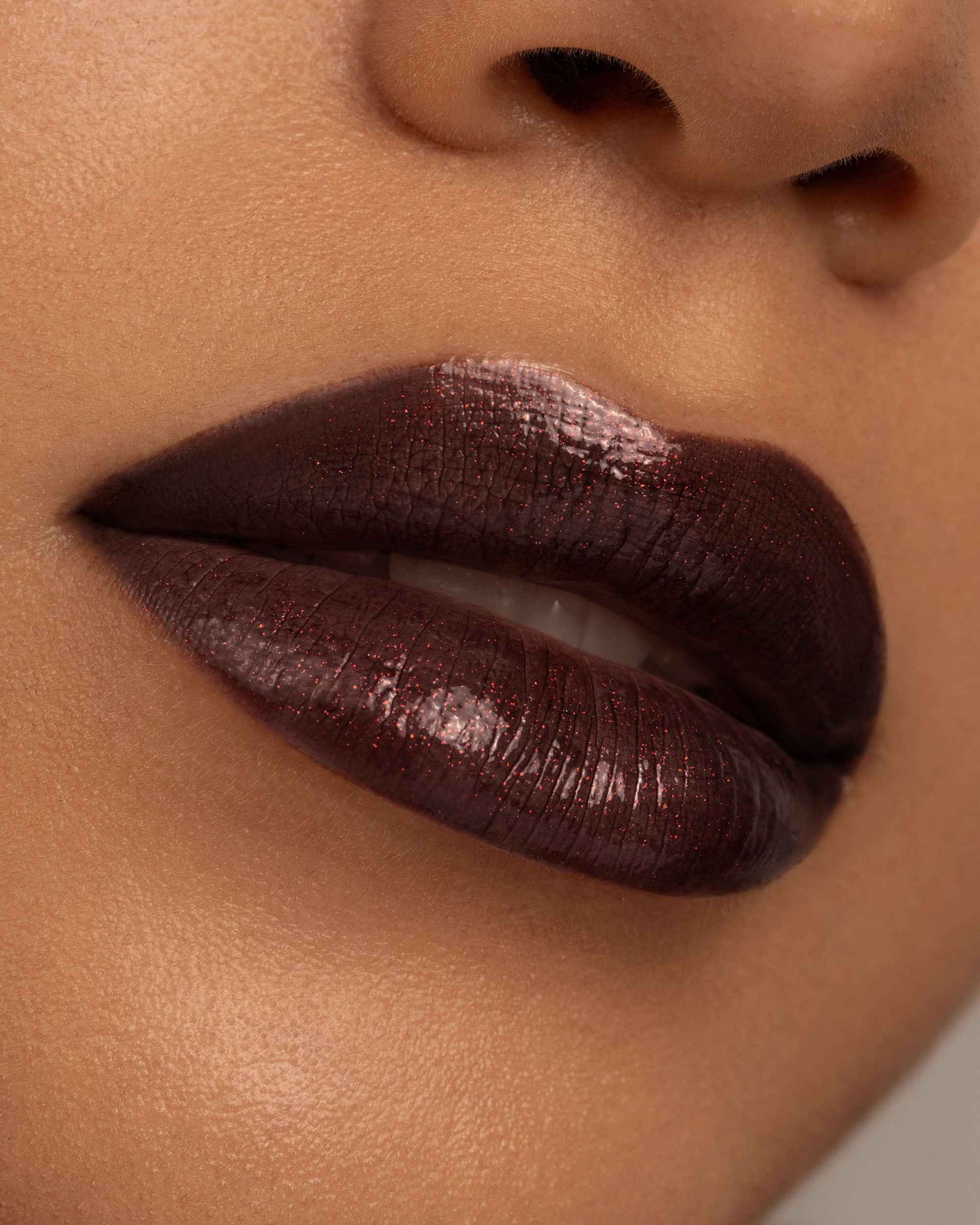 Close-up lip macro of Night Flower Thorn Bite lip oil