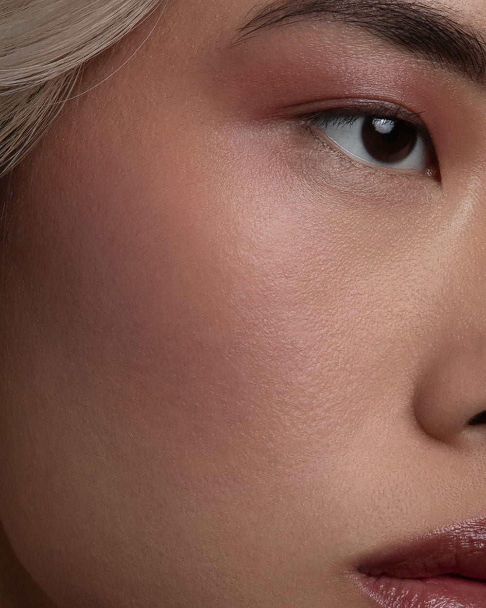 Close-up of a person's face with a focus on the eye area.