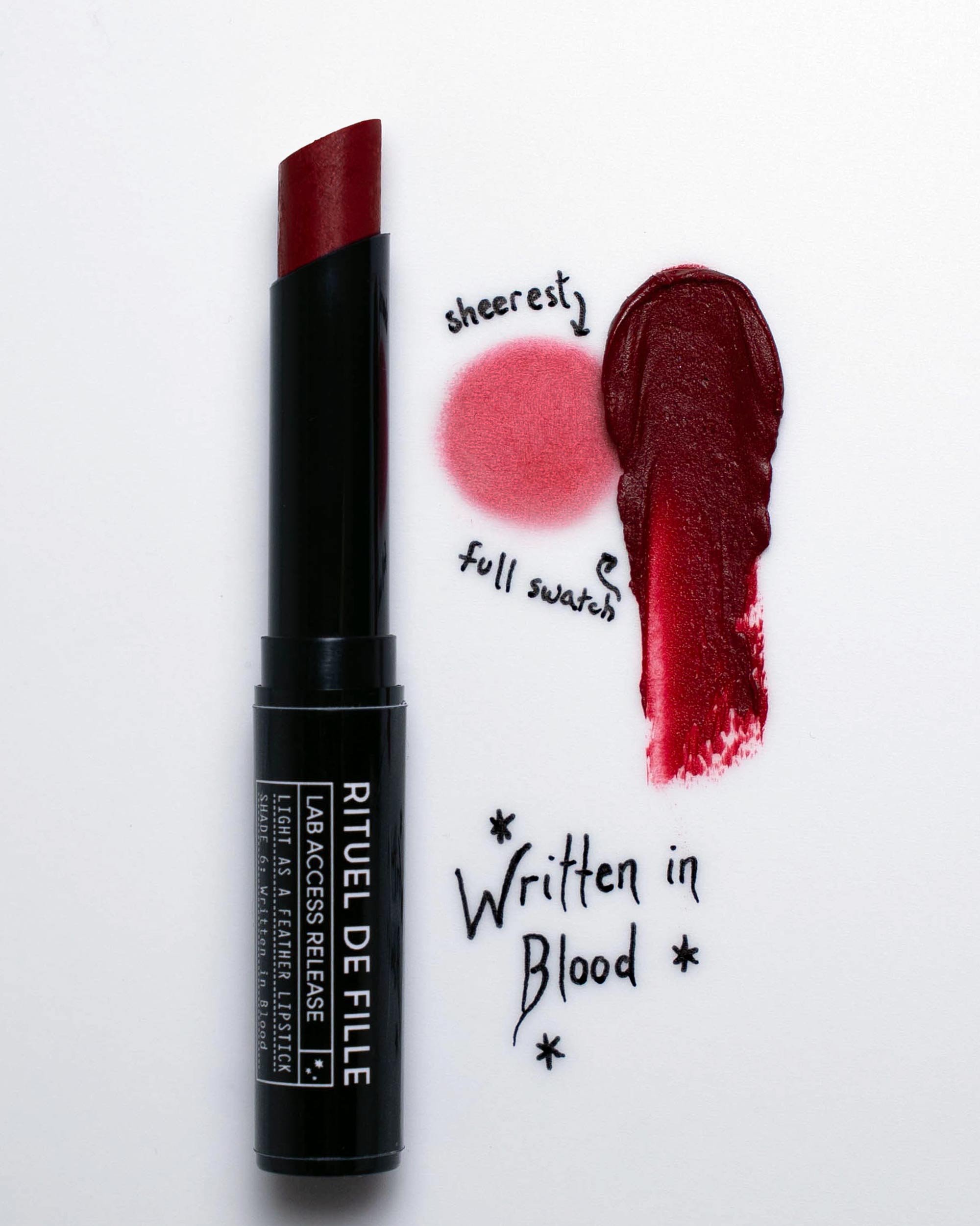 Lipstick with 'Written in Blood' shade on a white background